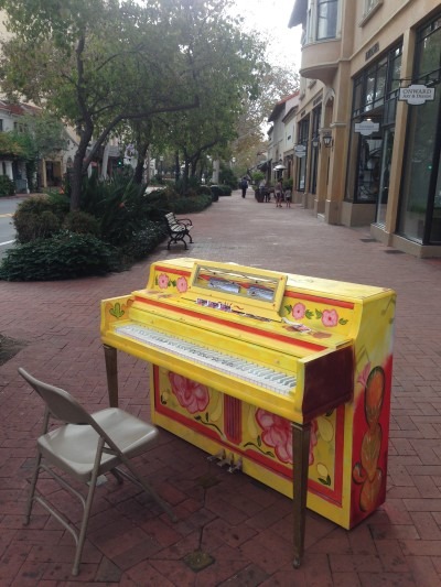 Piano on a sidewalk